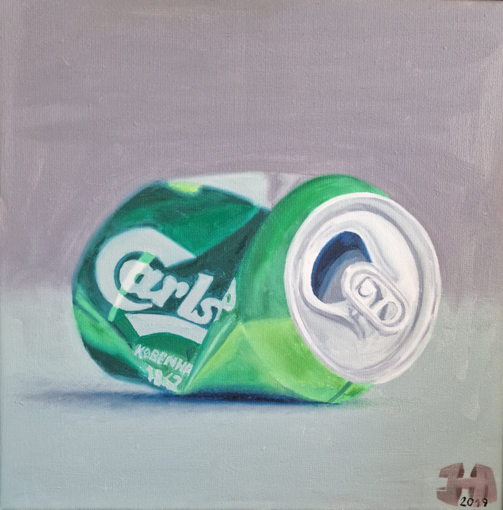 Crushed Carlsberg beer can - by Jesper Hansen